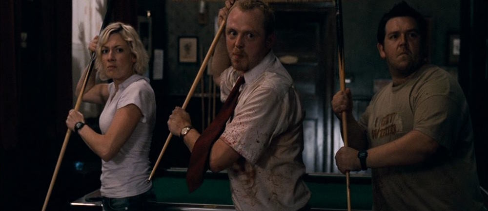 Three guys at the pub wielding pool clubs for weapons